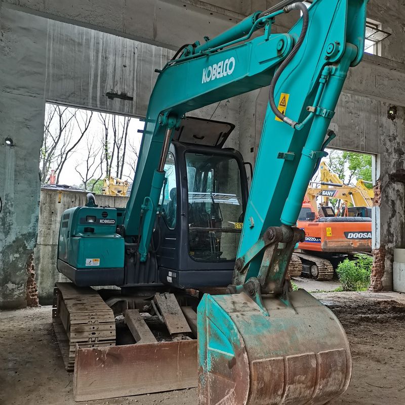 असली शूट 90% नई मूल जापान प्रयुक्त KOBELCO SK 75 क्रॉलर खुदाई मशीन बिक्री के लिए प्रयुक्त KOBELCO 75 जापानी प्रौद्योगिकी खुदाई मशीन